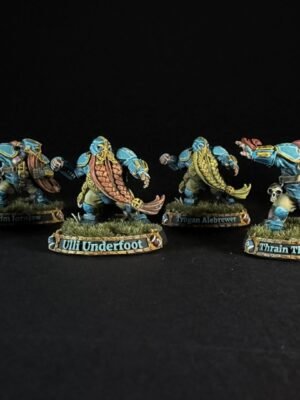 Six teal-armored dwarf miniatures with long braided beards on grassy round bases, labeled with names like Uli Underfoot and Train Thrice-Cursed.