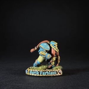 Miniature figure of a muscular armored warrior in blue and gold, crouching on a grassy base marked 'Barik Farblast'.