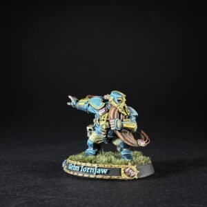 Painted fantasy miniature of a blue-armored warrior with gold trim, standing on a grassy base with a nameplate that reads 'Gdn Lornjaw'.
