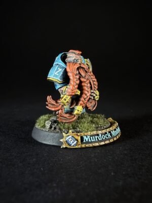 Miniature fantasy creature with orange tentacles and blue armor on a grassy base; nameplate reads 'Murdock Models'.