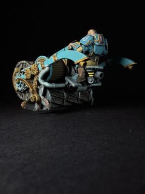 Steampunk blue-and-gold motorcycle with a armored rider on a dark background, close-up profile view.