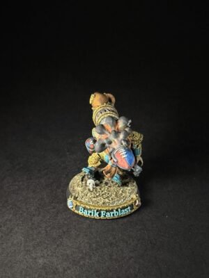 IMG_1143 Colorful painted dwarf miniature in ornate armor, standing on a rocky base labeled Barik Farblast, facing right.
