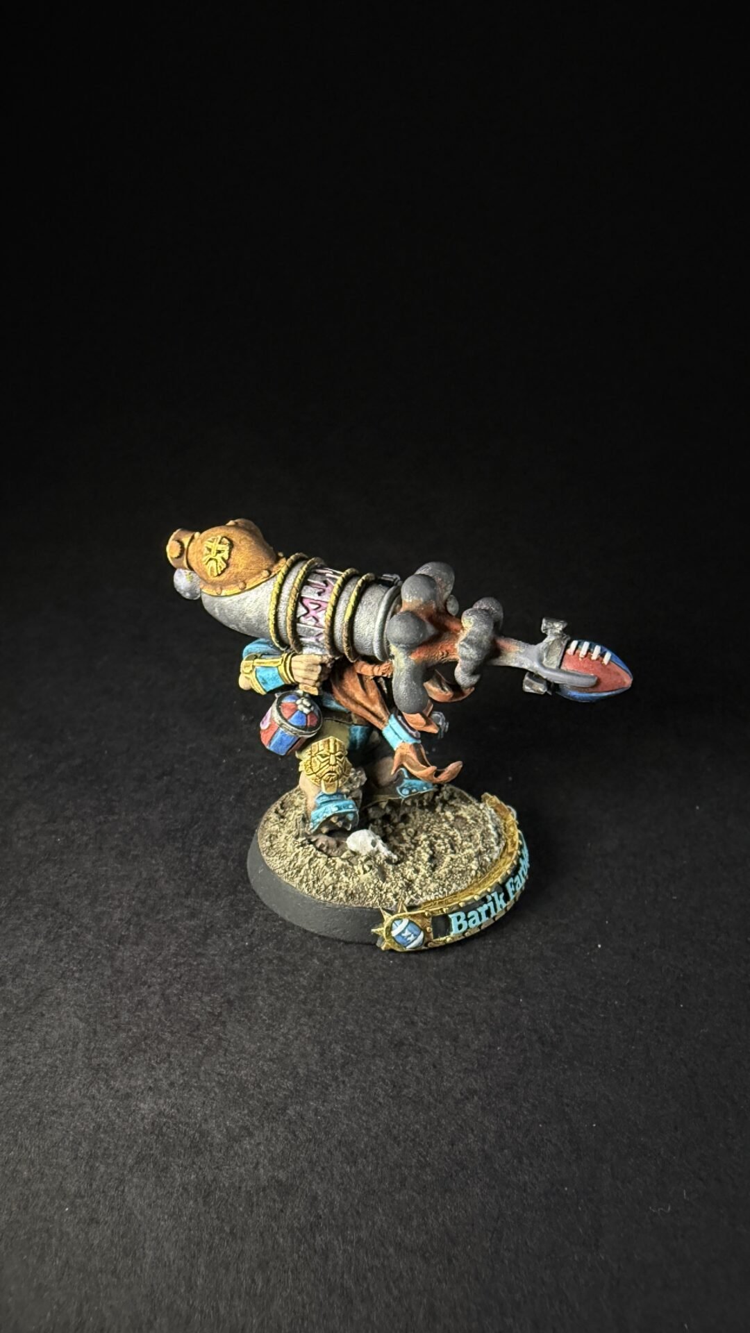 Painted miniature of a dwarf warrior with a large cannon-like weapon on a rocky base, Barik visible on the base label.