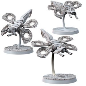 Three gray sci-fi spacecraft models with circular rotating engines on display bases, set against a white background.