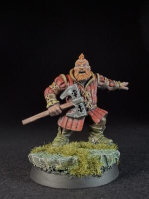 IMG_1491 Miniature dwarf warrior with orange beard in red armor, holding a double-headed axe, standing on a grassy base.
