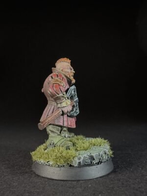 IMG_1493 Painted fantasy miniature of a bearded warrior in red armor, carrying a shield and club, standing on a mossy rocky base
