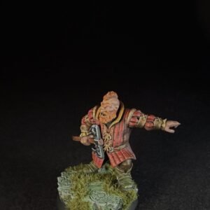 Fantasy dwarf miniature in red armor, wielding a war hammer with an outstretched left arm, standing on a grassy stone base.
