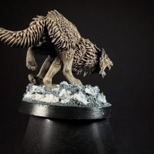 IMG_1840 Three fenrisian wolves miniatures standing on rocky, snow-covered base against a black background.