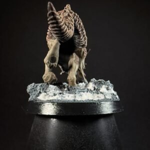 IMG_1841 Three fenrisian wolves miniatures standing on rocky, snow-covered
