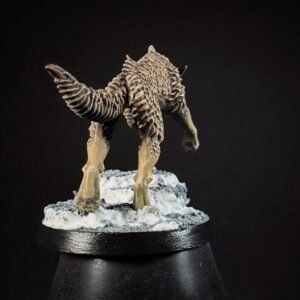 IMG_1849 Three fenrisian wolves miniatures standing on rocky, snow-covered