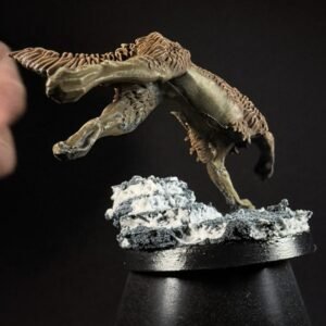 IMG_1857 Three fenrisian wolves miniatures standing on rocky, snow-covered
