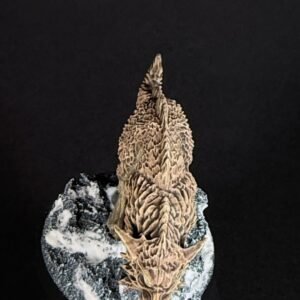 IMG_1861 Three fenrisian wolves miniatures standing on rocky, snow-covered
