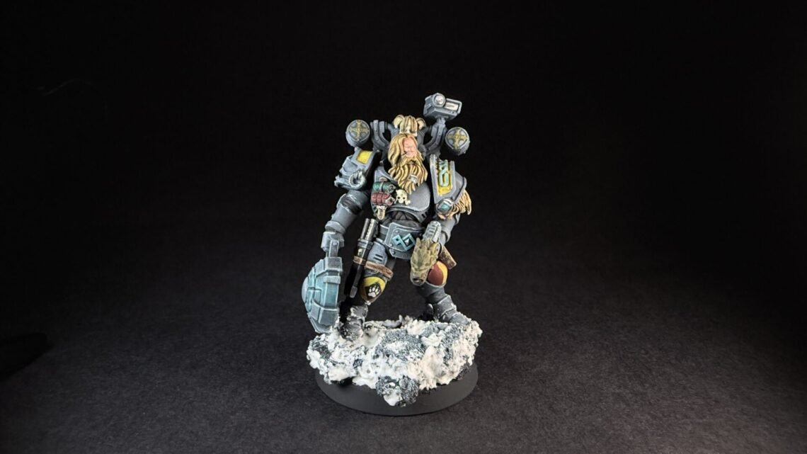 Painted Space Wolves Wolf Scout Trapmaster with plasma pistol and combat blade on snowy base
