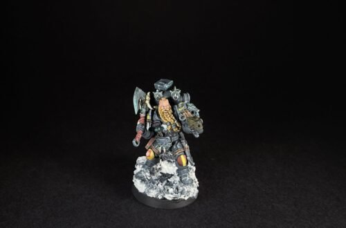Painted Space Wolves Wolf Scout Pack Leader with plasma pistol and power weapon on snowy base