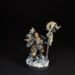 Painted Wolf Scout Rune Priest Skjald with Bolt Pistol and Runic Staff on snowy base.