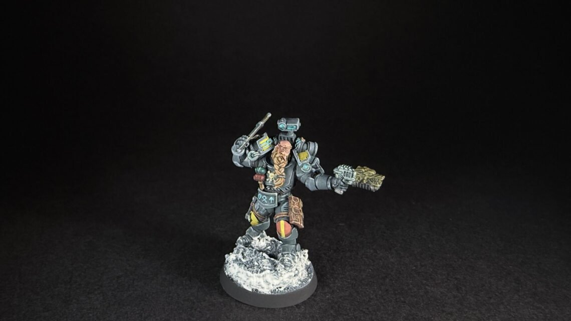 Painted Wolf Scout Hunter with Plasma Pistol and Combat Blade on snowy base.