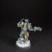 Painted Wolf Scout Hunter with Plasma Pistol and Combat Blade on snowy base.