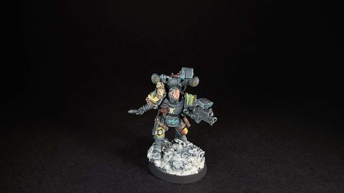 Painted Wolf Scout Fangbearer with Absolvor Bolt Pistol and Combat Blade on snowy base.