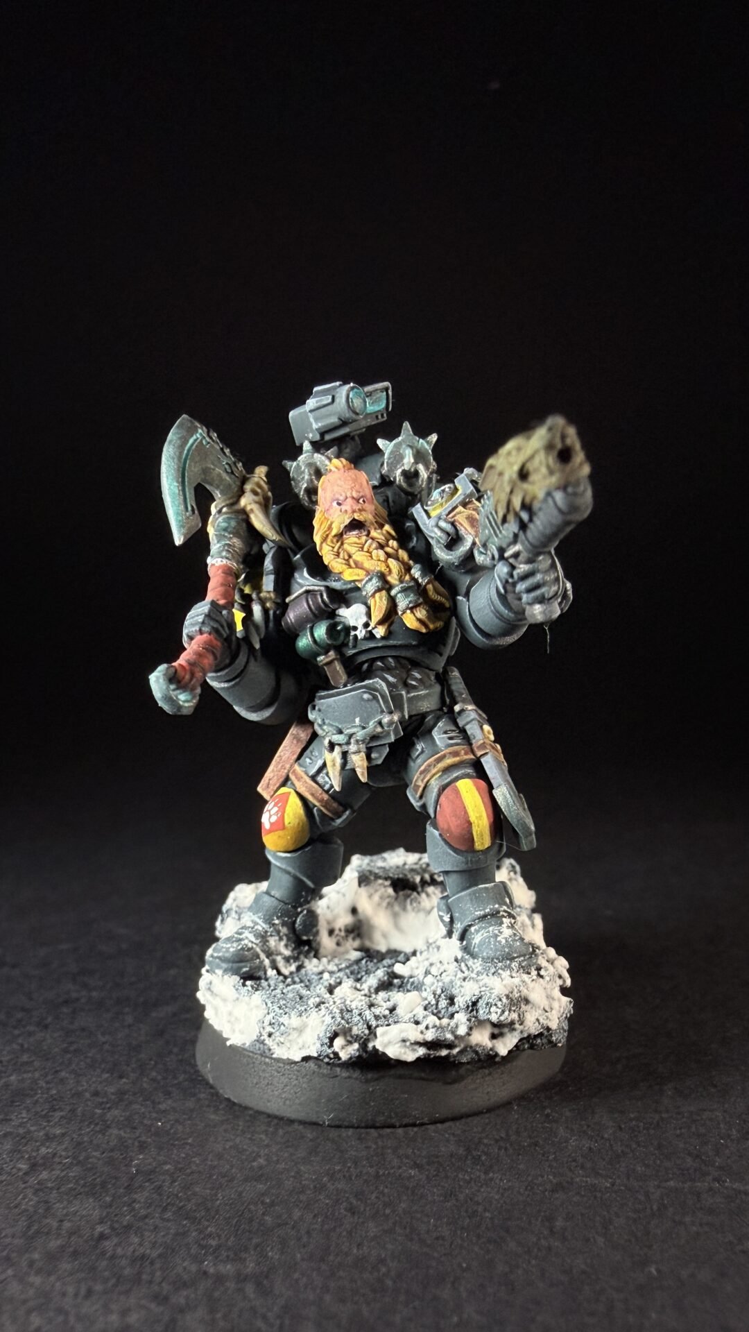 Painted Space Wolves Wolf Scout Pack Leader with plasma pistol and power weapon on snowy base