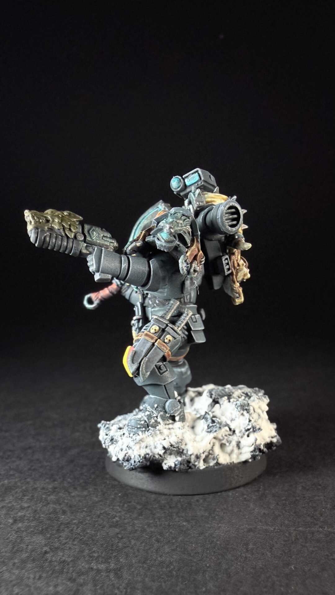 Painted Space Wolves Wolf Scout Pack Leader with plasma pistol and power weapon on snowy base