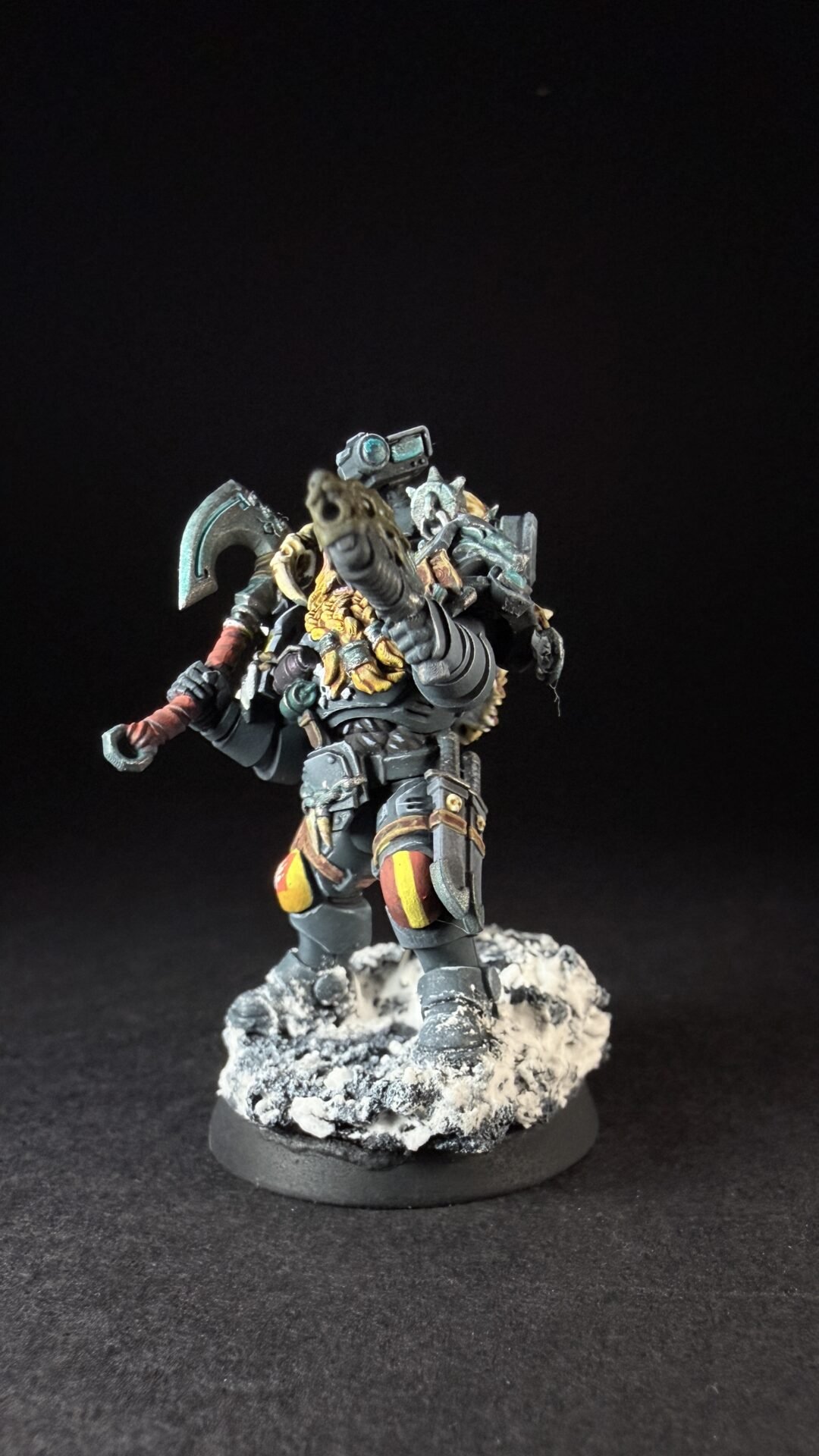 Painted Space Wolves Wolf Scout Pack Leader with plasma pistol and power weapon on snowy base