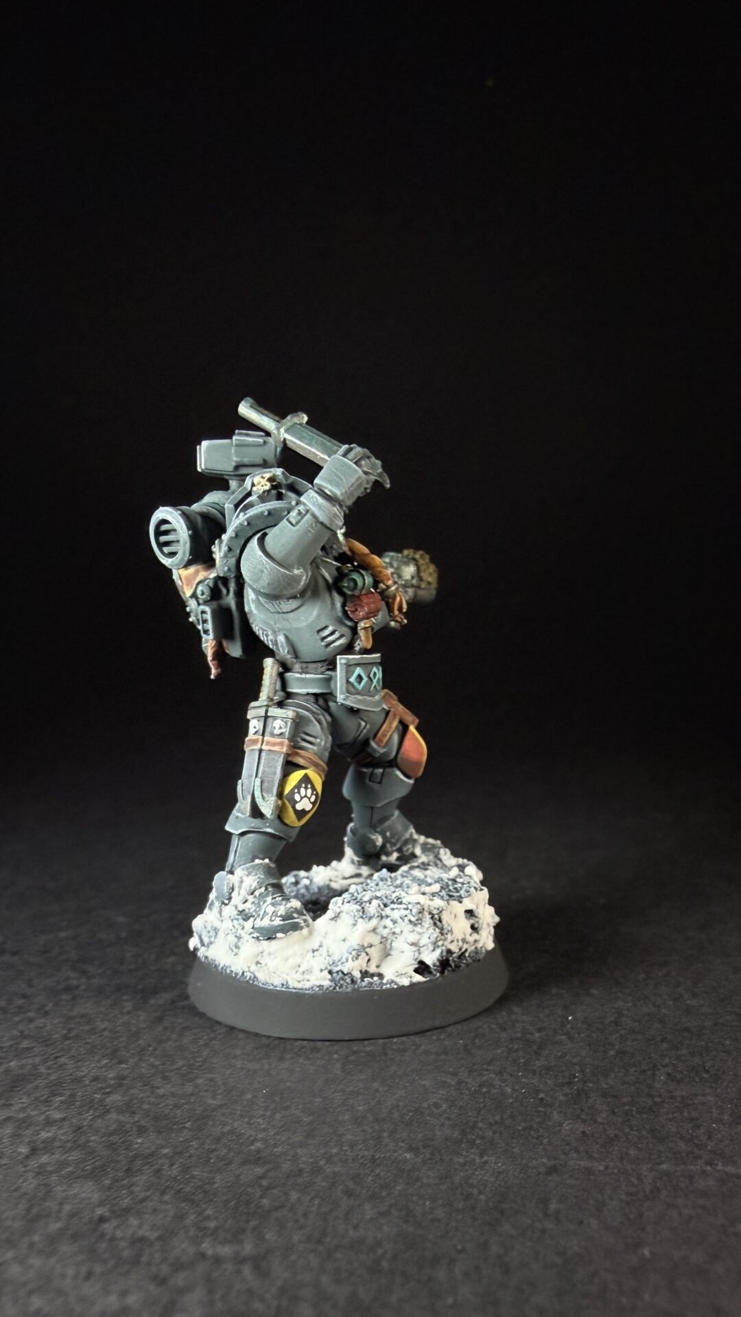 Painted Wolf Scout Hunter with Plasma Pistol and Combat Blade on snowy base.