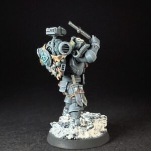 Painted Wolf Scout Hunter_2026 Painted Wolf Scout Hunter with Plasma Pistol and Combat Blade on snowy base.