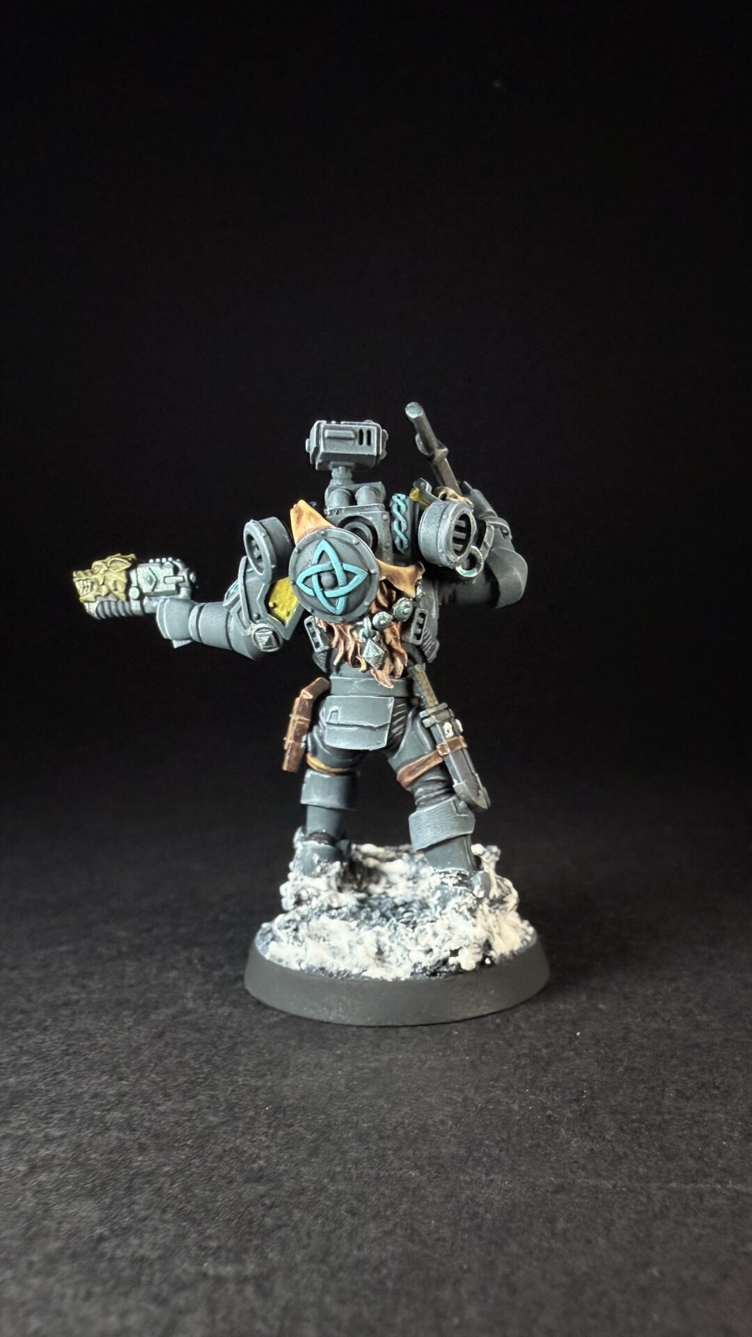 Painted Wolf Scout Hunter with Plasma Pistol and Combat Blade on snowy base.