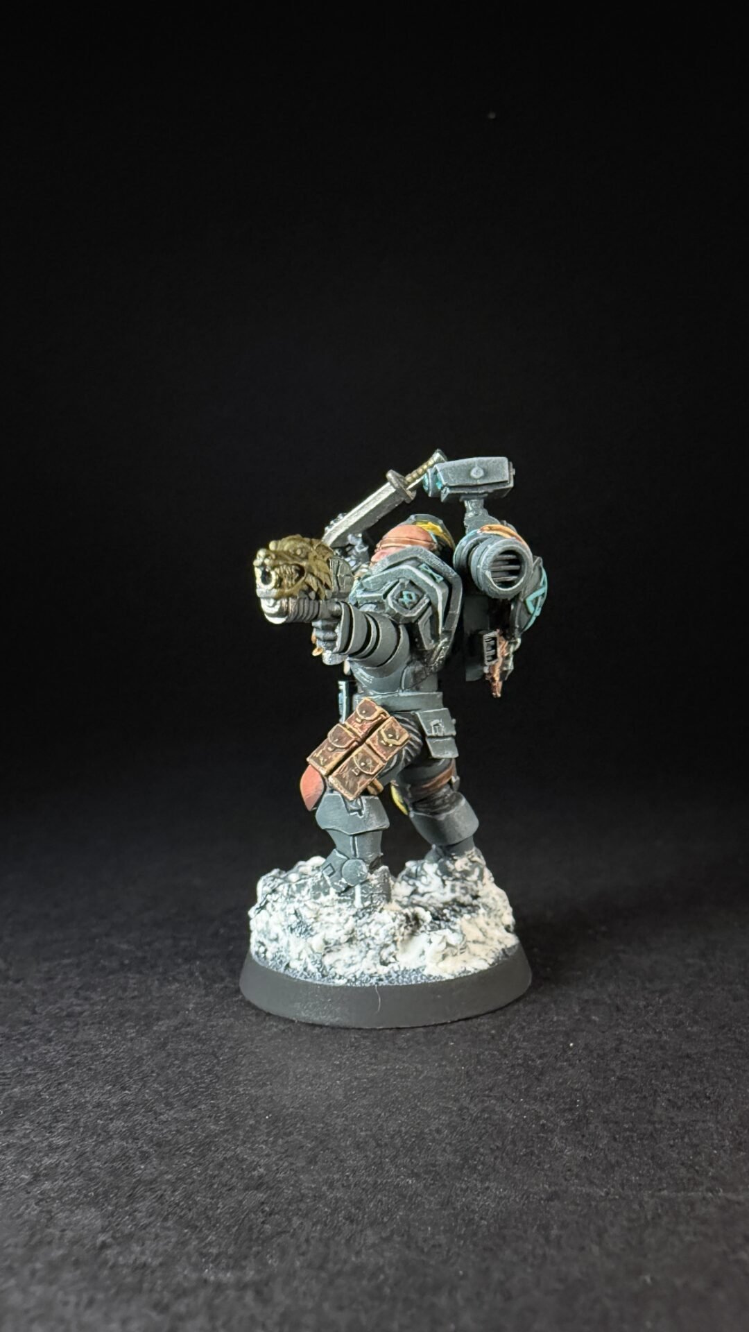 Painted Wolf Scout Hunter with Plasma Pistol and Combat Blade on snowy base.