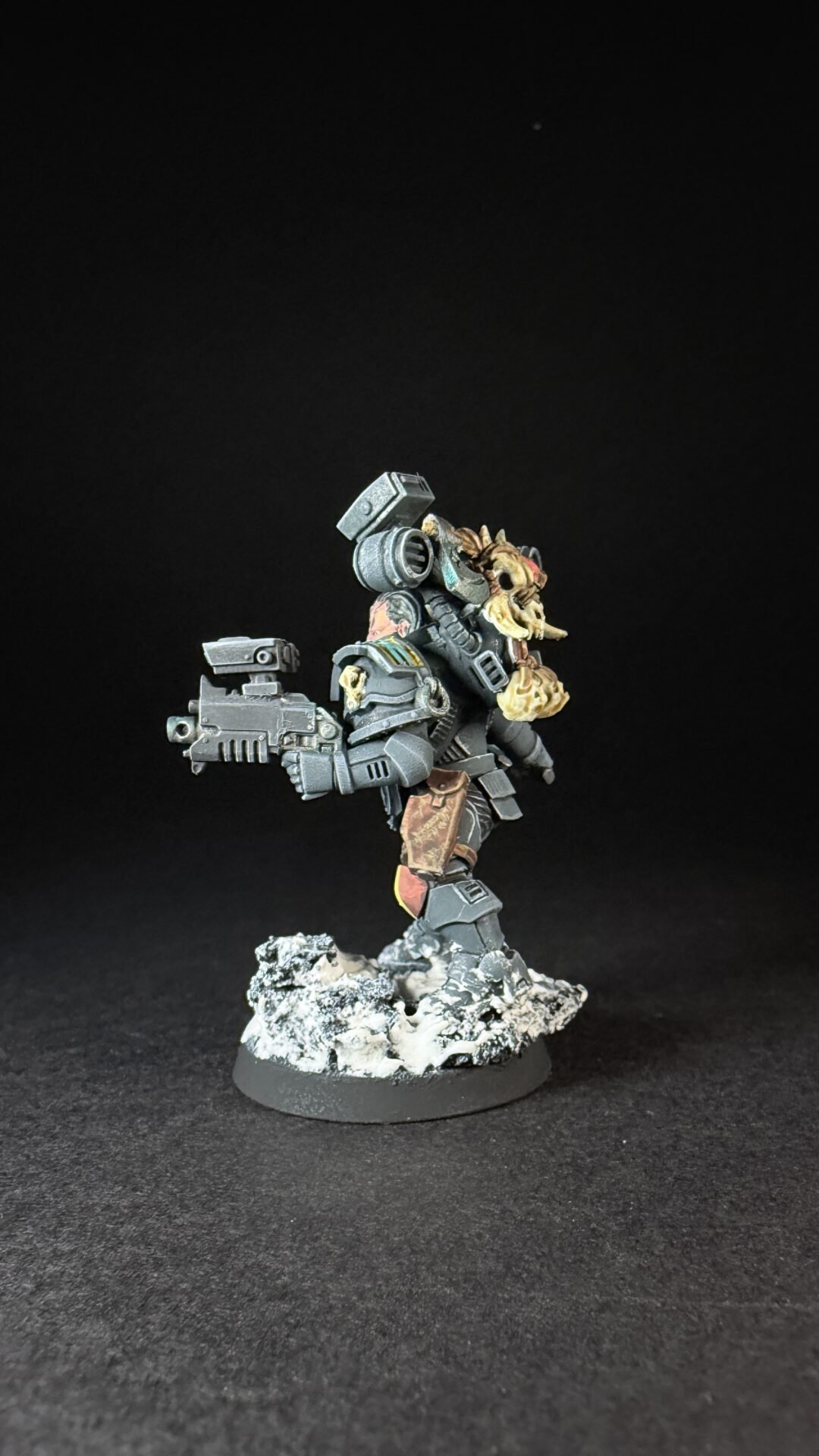 Painted Wolf Scout Fangbearer with Absolvor Bolt Pistol and Combat Blade on snowy base.