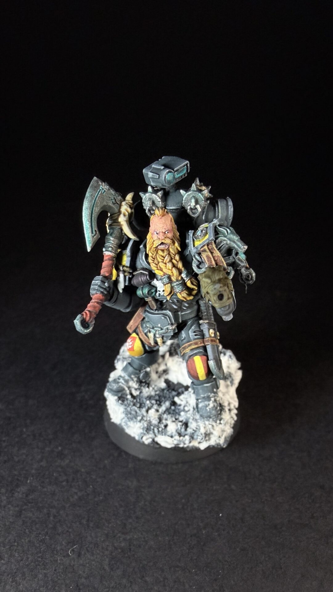 Painted Space Wolves Wolf Scout Pack Leader with plasma pistol and power weapon on snowy base