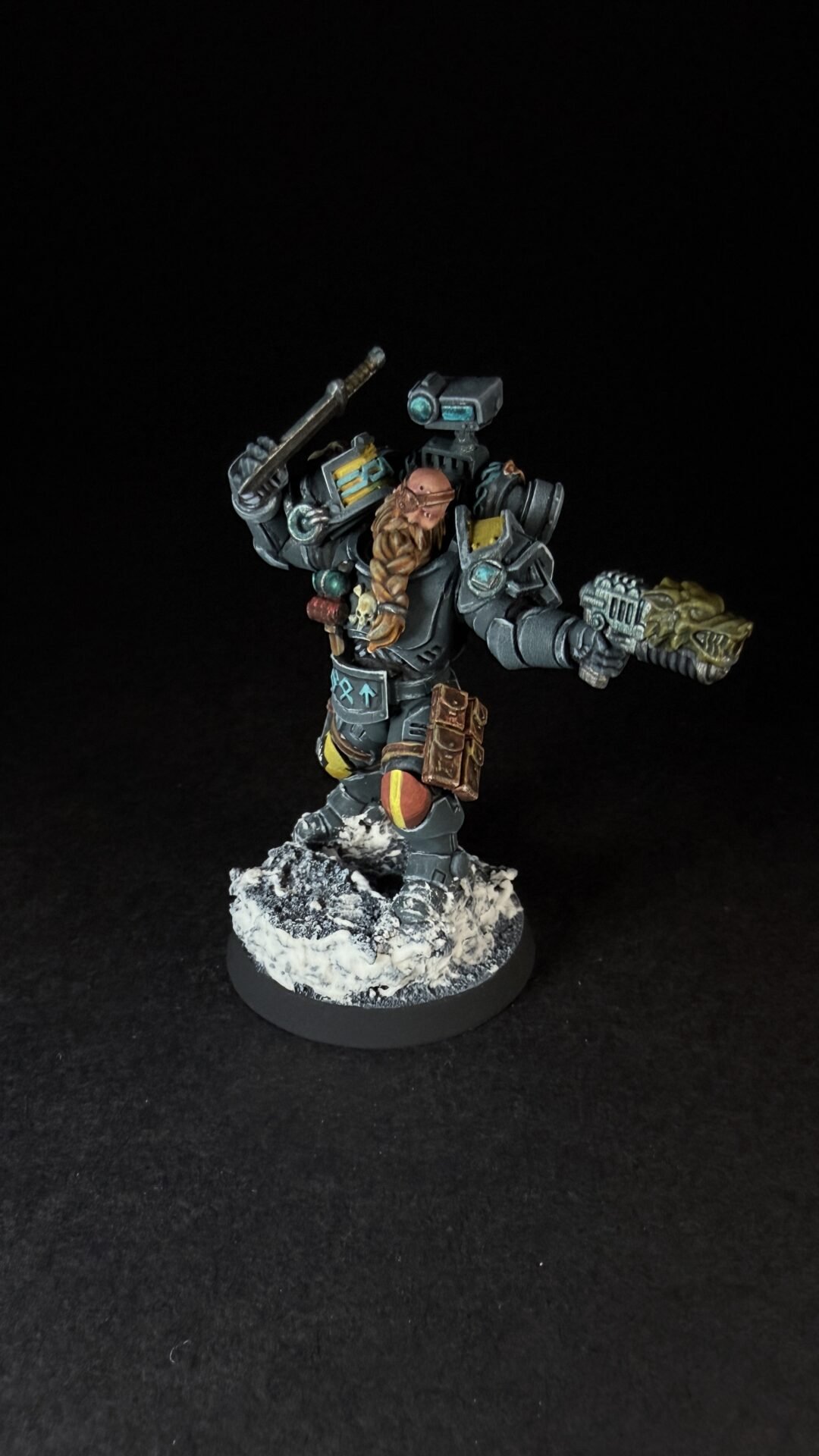 Painted Wolf Scout Hunter with Plasma Pistol and Combat Blade on snowy base.