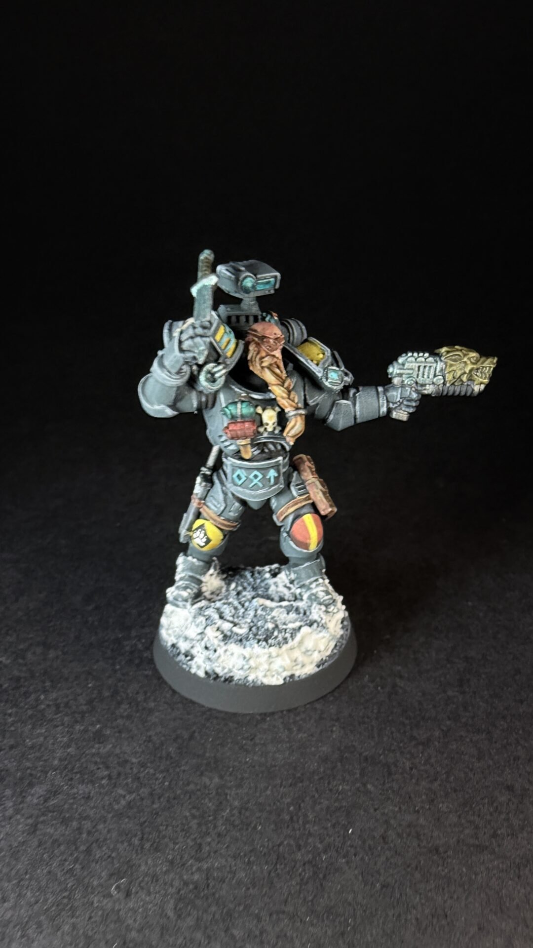 Painted Wolf Scout Hunter with Plasma Pistol and Combat Blade on snowy base.
