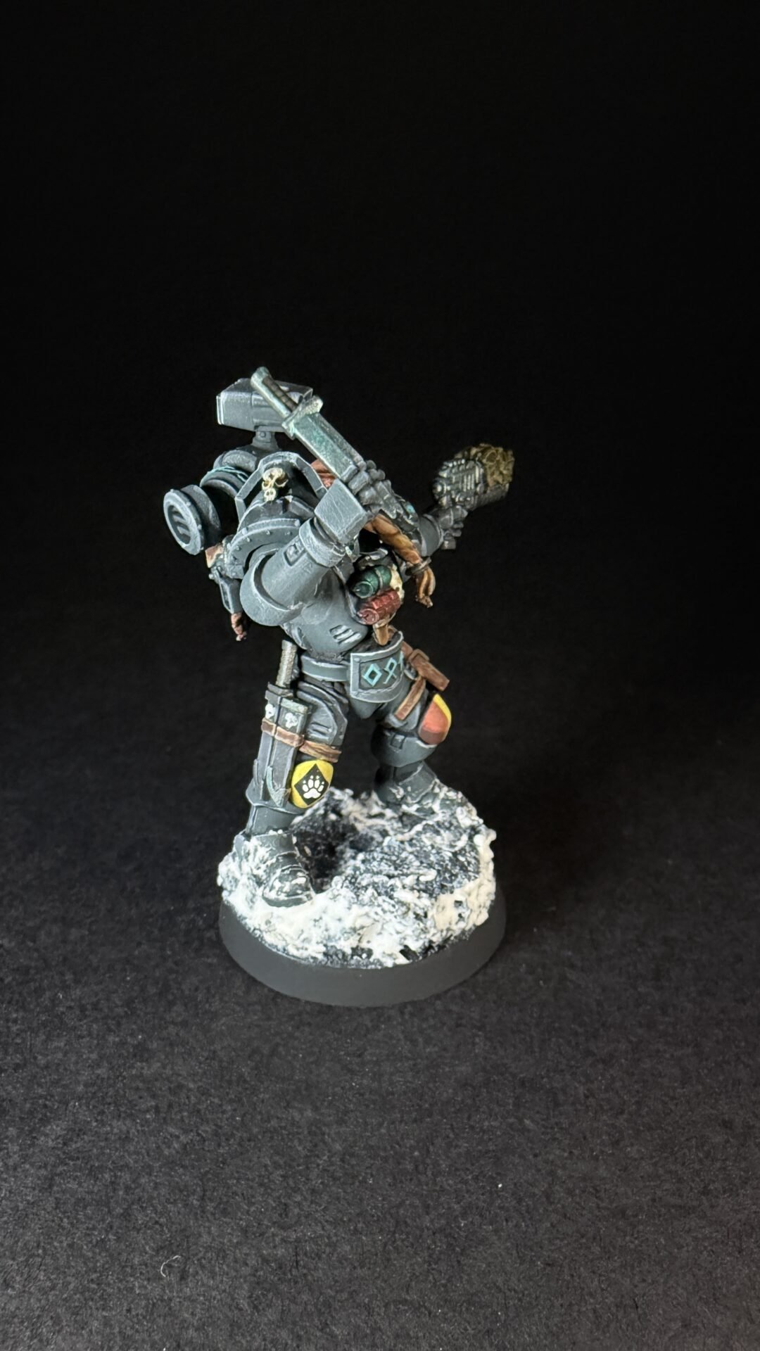 Painted Wolf Scout Hunter with Plasma Pistol and Combat Blade on snowy base.