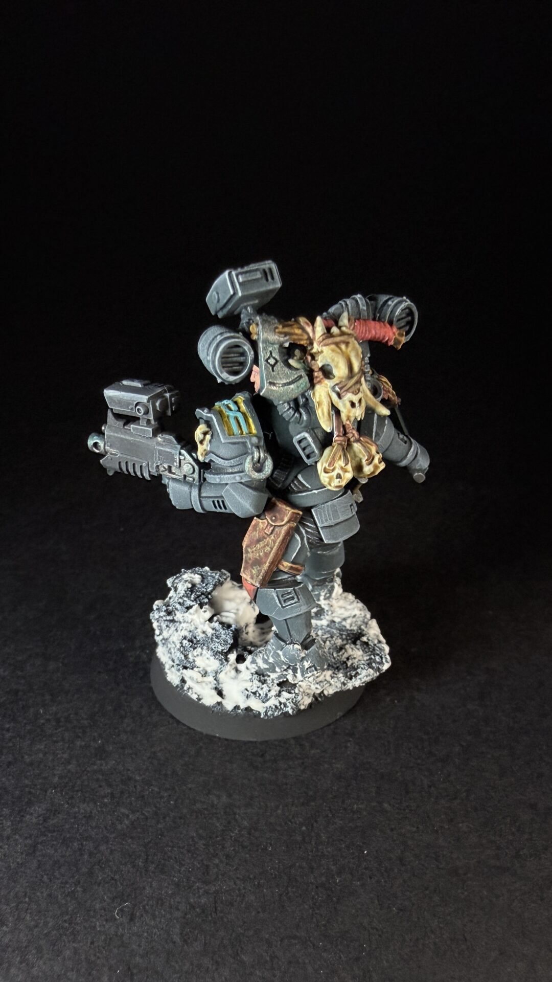 Painted Wolf Scout Fangbearer with Absolvor Bolt Pistol and Combat Blade on snowy base.