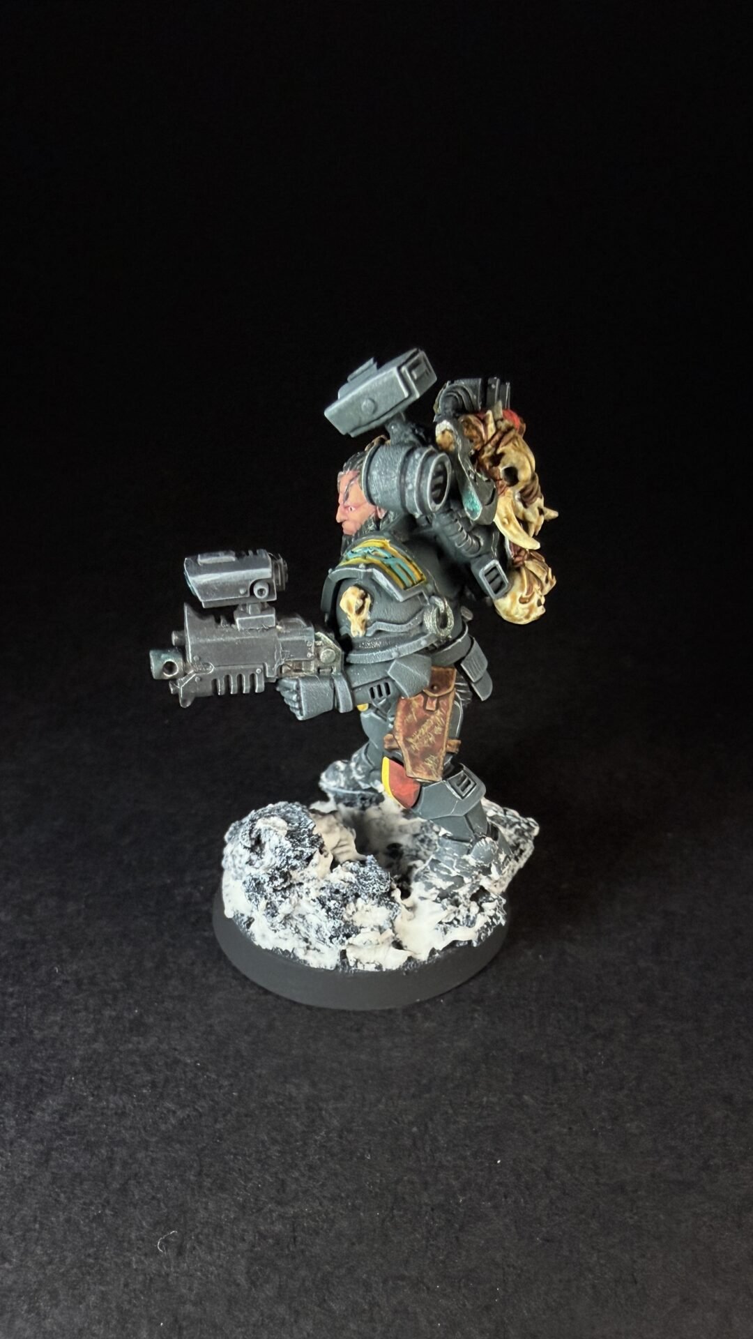 Painted Wolf Scout Fangbearer with Absolvor Bolt Pistol and Combat Blade on snowy base.