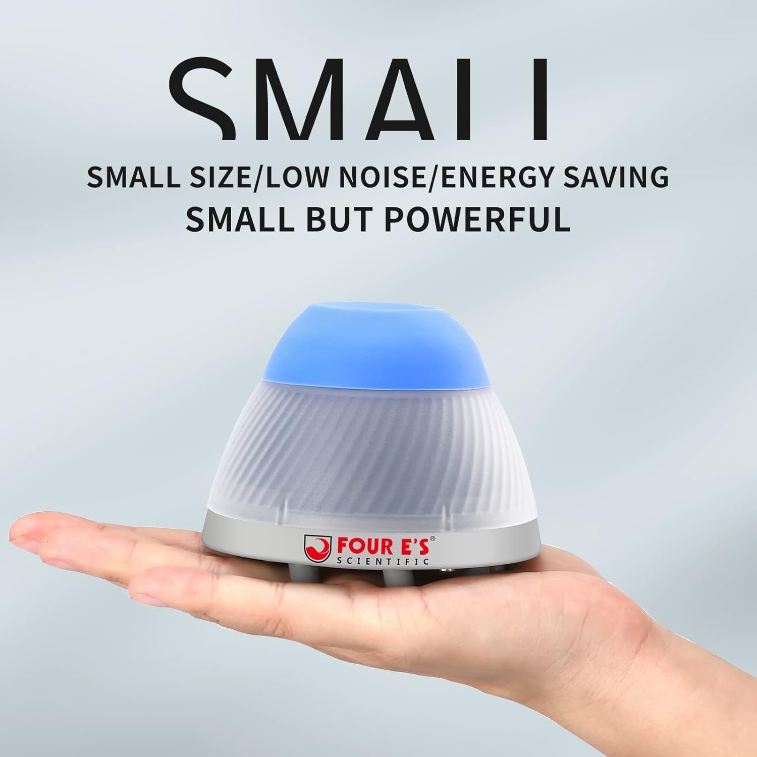 Small palm-sized device with blue cap, Four E's Scientific branding, promoting small size, low noise, energy saving.